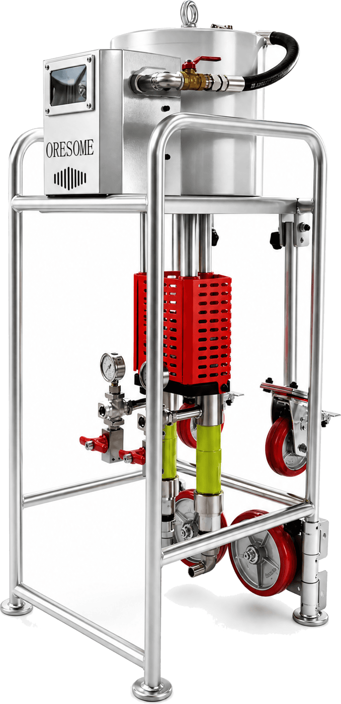 Cut-out photograph of a pneumatic grouting pump: a stainless steel drum and control box standing on an open tubular cage, a perforated red guard around the pump barrel below them, and red wheels between the cage legs.